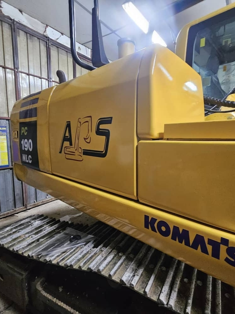 Adhésif sur pelle hydraulique